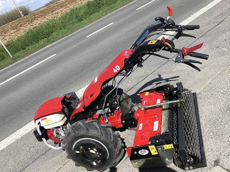 001_Motoculteur_powersafe_340_ferrari_Location_grue_remorque_nacelle_machine_Pierre_Debyttere_Transport_Celles_location_machines_engins_Tournai_Frasnes_Mons_Mouscron